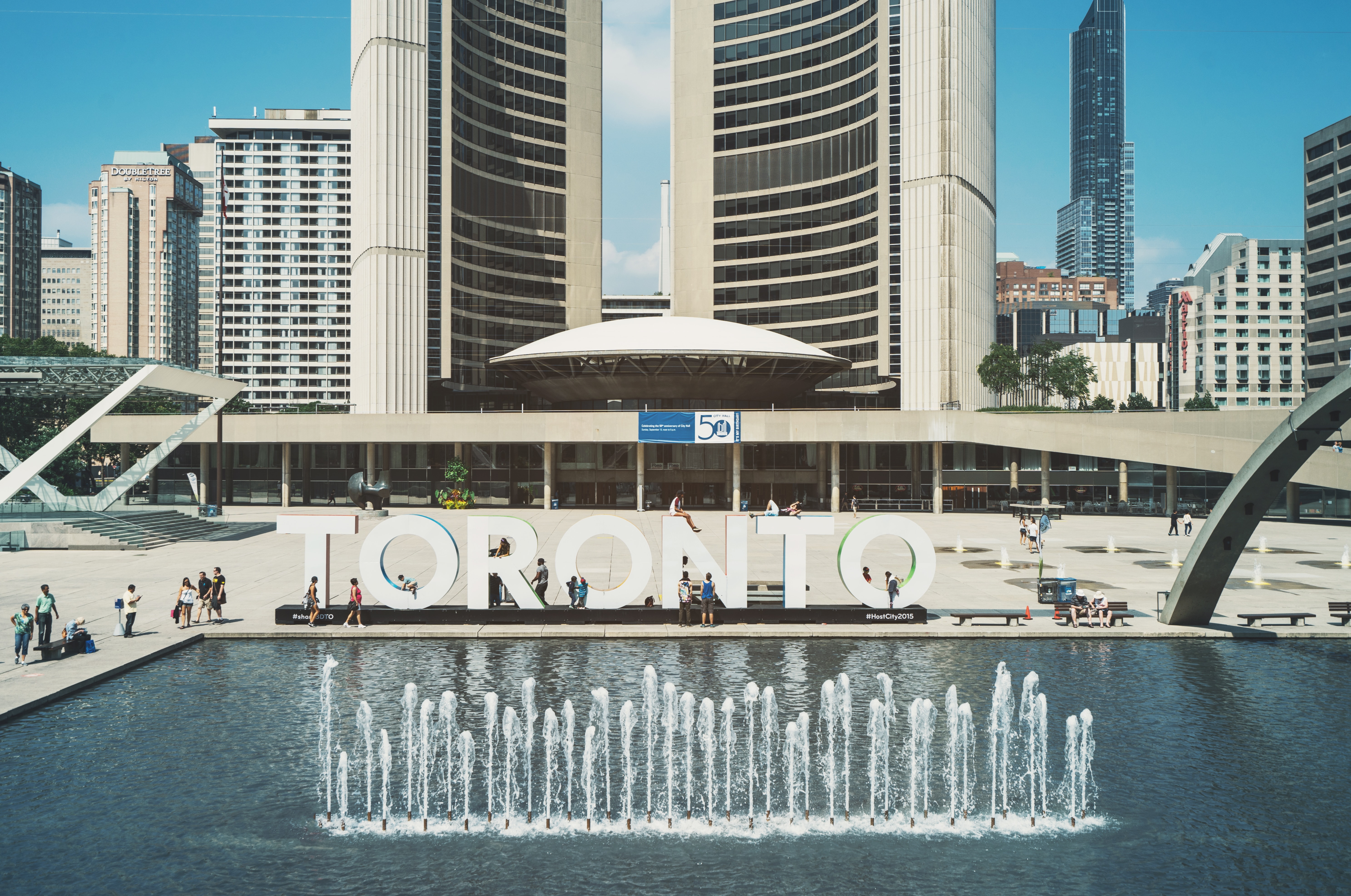 A photo of Toronto city hall representing a municipal employee with the city and a case about employee benefits
